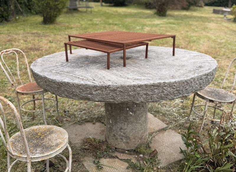 A strong, tireless stone. Once a millstone, now a table.
